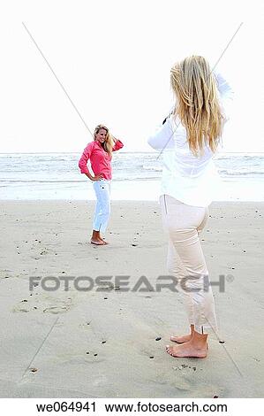 Teen age girls at the beach View Large Photo Image Stock Image - Teen age girls at the beach. Fotosearch
