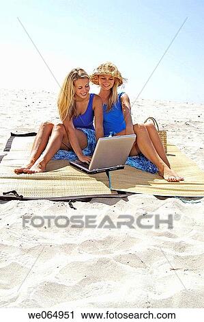 Teen age girls at the beach View Large Photo Image Stock Image - Teen age girls at the beach. Fotosearch