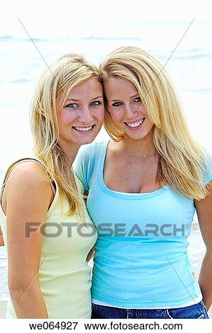 Stock Photo - Teen age girls at the beach. Fotosearch