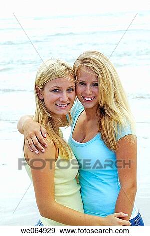 Teen age girls at the beach View Large Photo Image Stock Photo - Teen age girls at the beach. Fotosearch
