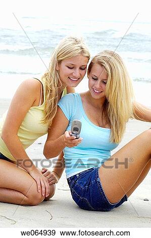 Teen age girls at the beach View Large Photo Image Stock Photo - Teen age girls at the beach. Fotosearch