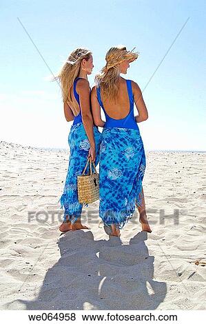 Teen age girls at the beach View Large Photo Image Stock Photo - Teen age girls at the beach. Fotosearch