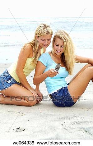 Teen age girls at the beach View Large Photo Image Stock Photography - Teen age girls at the beach. Fotosearch