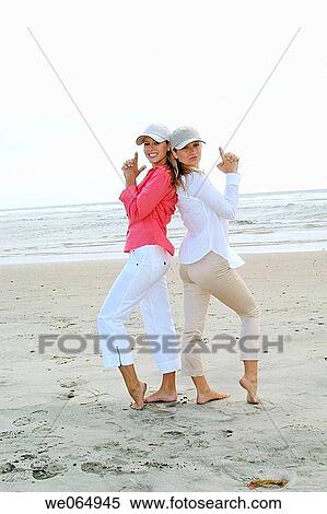 Teen age girls at the beach View Large Photo Image Stock Photography - Teen age girls at the beach. Fotosearch