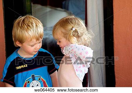 two, 3 year old children together shes lifting up her top and showing him her tummy View Large Photo Image Stock Photography - two, 3 year old children together shes lifting up her top and showing him her tummy. Fotosearch