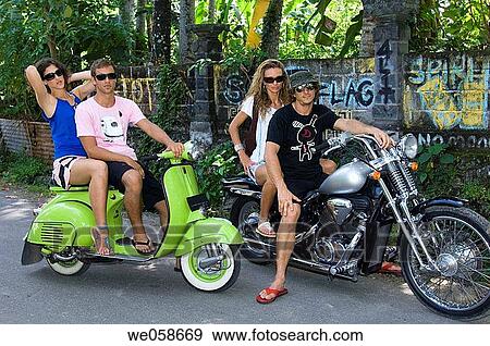 Two young couples on motorbikes View Large Photo Image Stock Photo - Two young couples on motorbikes. Fotosearch