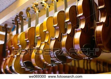 Violins on Rack in Violin Repair Shop View Large Photo Image Stock Image - Violins on Rack in Violin Repair Shop. Fotosearch