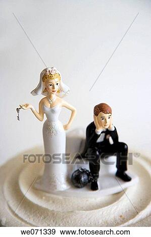 Stock Photo - Wedding figurines on cake.. Fotosearch