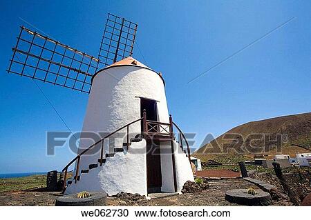 Windmill in Jard? n de Cactus (Cactus Garden) by Cesar Manrique, Guatiza. Lanzarote, Canary Islands, Spain View Large Photo Image Stock Image - Windmill in Jard? n de Cactus (Cactus Garden) by Cesar Manrique, Guatiza. Lanzarote, Canary Islands, Spain. Fotosearch