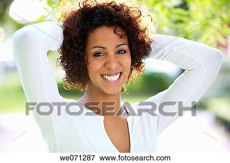Stock Photo - woman, ethnic background: half Cuban, half German. Fotosearch