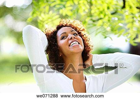 Stock Photo - woman, ethnic background: half Cuban, half German. Fotosearch