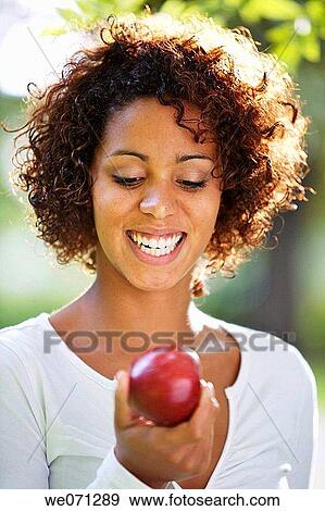 Stock Photo - woman, ethnic background: half Cuban, half German. Fotosearch