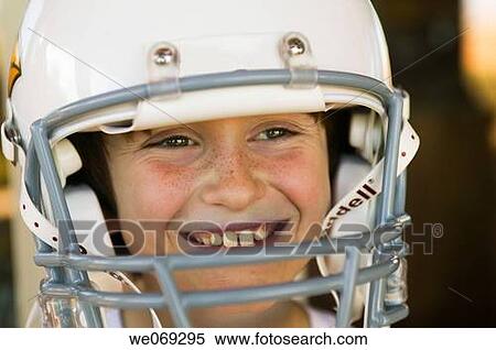 Young Boy wearing Football Helmet View Large Photo Image Stock Photography - Young Boy wearing Football Helmet. Fotosearch