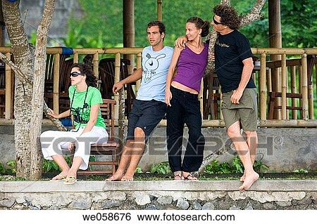 Young couples on holiday View Large Photo Image Stock Photograph - Young couples on holiday. Fotosearch