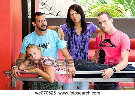 Young people posing in colorful casual clothing View Large Photo Image Stock Photography - Young people posing in colorful casual clothing. Fotosearch