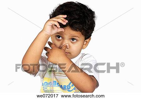 A boy making funny expression. View Large Photo Image Stock Photo - A boy making funny expression.. Fotosearch