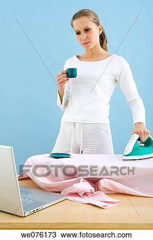 Stock Image - absent-mindedness, coffee, clothes, Absent-minded. Fotosearch