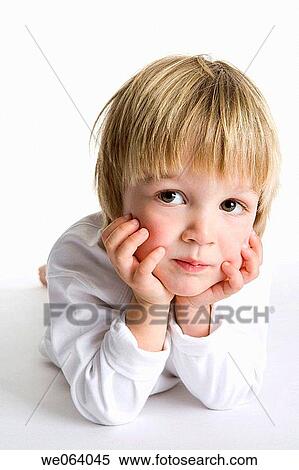 absorbed, child, boy, blond, 3-4 years View Large Photo Image Stock Photography - absorbed, child, boy, blond, 3-4 years. Fotosearch