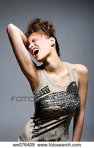 aggressiveness, brunette, aggressive View Large Photo Image Stock Photo - aggressiveness, brunette, aggressive. Fotosearch