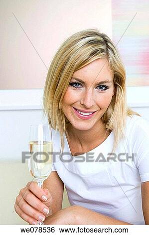 Stock Photograph - Alcoholic beverage, blond, at-home, Alcoholic drink, alcohol. Fotosearch