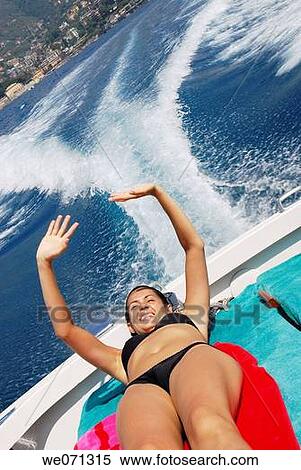 Stock Photography - amusement, bask, Arms raised, adolescence. Fotosearch