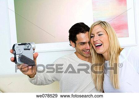 amusement, camcorder, at-home, affection View Large Photo Image Stock Photo - amusement, camcorder, at-home, affection. Fotosearch