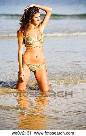 Stock Image - arm, beauty, beach, 20's. Fotosearch