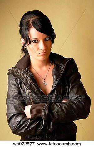 Arms crossed, brunette, Bad mood, arms folded, adolescence View Large Photo Image Stock Photo - Arms crossed, brunette, Bad mood, arms folded, adolescence. Fotosearch