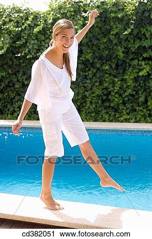 Arms open, border, barefoot, balance, amusement View Large Photo Image Stock Image - Arms open, border, barefoot, balance, amusement. Fotosearch