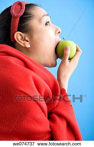 Asian, blanket, biting, bite, apple View Large Photo Image Stock Photo - Asian, blanket, biting, bite, apple. Fotosearch