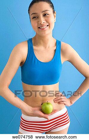 Stock Photo - Asian, diet, contemporary, apple. Fotosearch
