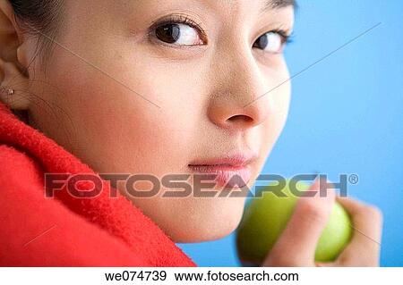 Asian, ethnic, Close-up, apple View Large Photo Image Stock Photo - Asian, ethnic, Close-up, apple. Fotosearch
