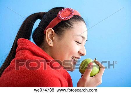 Asian, ethnicity, ethnic, apple View Large Photo Image Stock Photo - Asian, ethnicity, ethnic, apple. Fotosearch