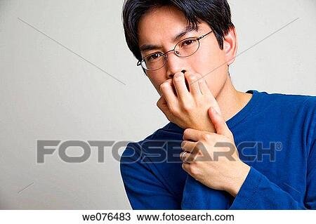 Asian man, wearing glasses, posing. View Large Photo Image Stock Image - Asian man, wearing glasses, posing.. Fotosearch