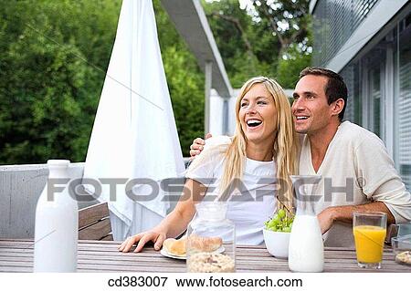 Stock Photo - at-home, breakfast, bonding, bond, affection. Fotosearch