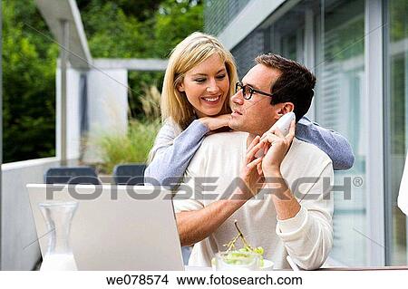 Picture - at-home, calling, affection. Fotosearch