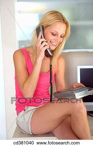 at-home, calling, blond, addiction View Large Photo Image Stock Image - at-home, calling, blond, addiction. Fotosearch
