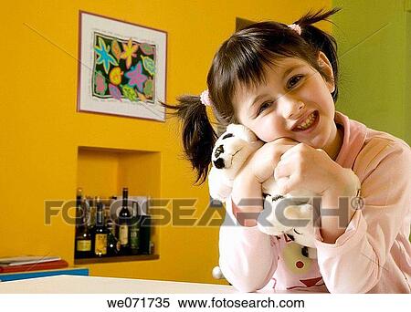 at-home, childhood, child, brunette, affection View Large Photo Image Stock Photography - at-home, childhood, child, brunette, affection. Fotosearch