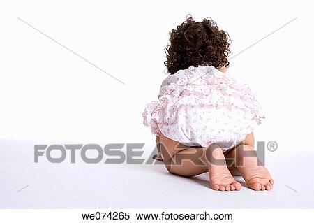 baby, back view, barefoot, brunette, child, childhood View Large Photo Image Stock Photography - baby, back view, barefoot, brunette, child, childhood. Fotosearch