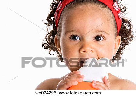 baby, bite, biting, brunette, child, childhood View Large Photo Image Stock Photograph - baby, bite, biting, brunette, child, childhood. Fotosearch