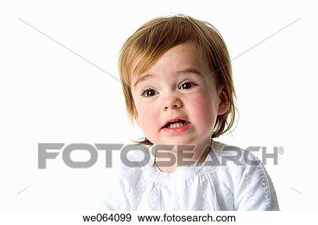 Stock Photo - baby, Brown eye, brunette, child, childhood. Fotosearch