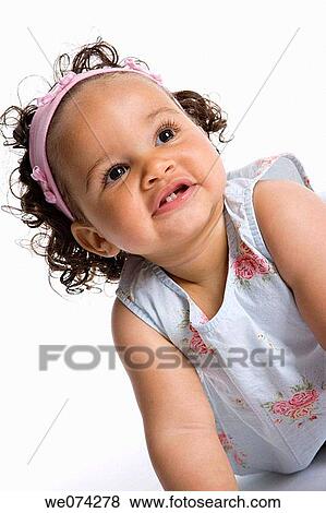 Stock Photo - baby, brunette, child, childhood, contemporary. Fotosearch