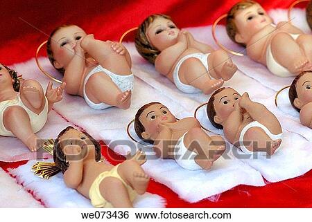 Baby Jesus figures for sale at fair. Fira de Santa Ll·cia, Barcelona, Catalonia, Spain View Large Photo Image Stock Photograph - Baby Jesus figures for sale at fair. Fira de Santa Ll·cia, Barcelona, Catalonia, Spain. Fotosearch