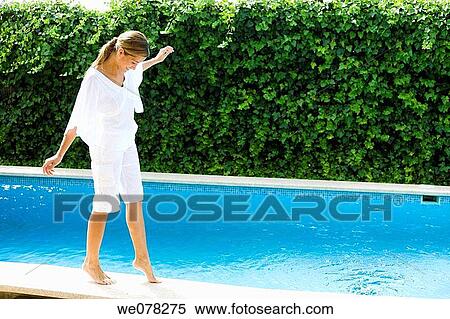 balance, brown hair, border, barefoot, Arms open View Large Photo Image Stock Photography - balance, brown hair, border, barefoot, Arms open. Fotosearch