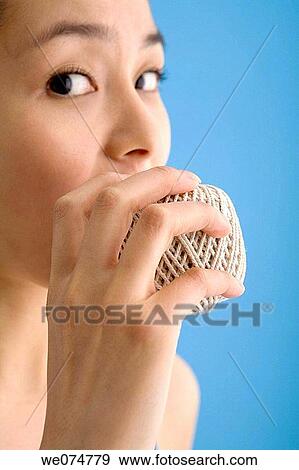 ball, Close-up, biting, bite, Asian View Large Photo Image Stock Photo - ball, Close-up, biting, bite, Asian. Fotosearch