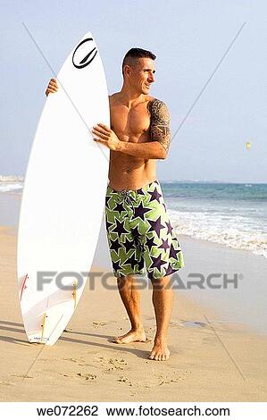 Stock Image - barefoot, beach, board. Fotosearch