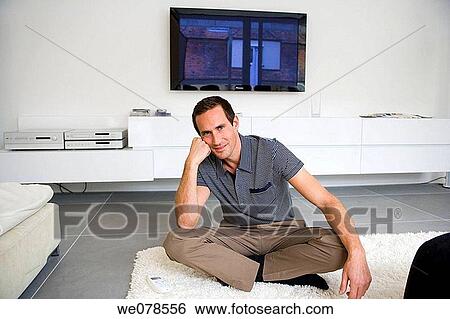 Stock Photograph - barefoot, carpet, calm, at-home. Fotosearch