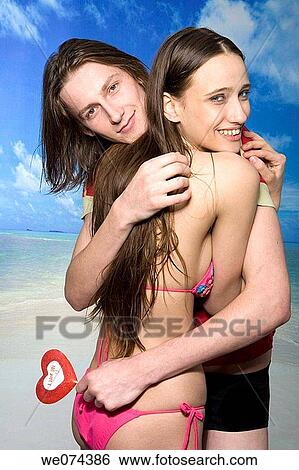 Stock Photograph - bathing-suit, bond, beach, affection. Fotosearch