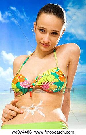 beach, belly, Body care, brunette View Large Photo Image Stock Photograph - beach, belly, Body care, brunette. Fotosearch