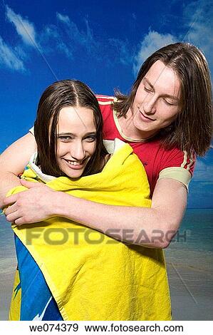 Stock Photo - beach, bond, bonding, Care take. Fotosearch